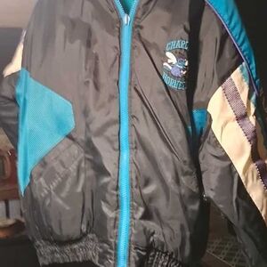 STARTER Teal and Black Charlotte Hornets Puffer Jacket